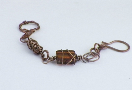Disk and wire wrapped glass bracele 