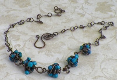 Unique turquoise wire wrapped howlite chip necklace