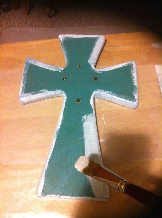 First primer the cross with gesso