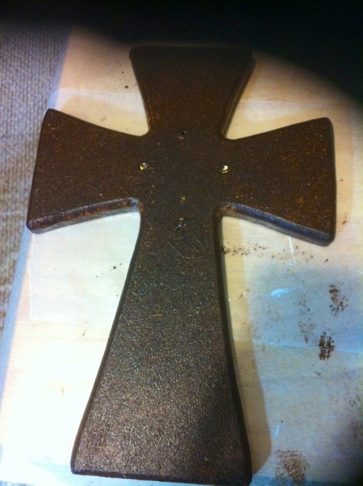 Handpainted cross that resembles leather