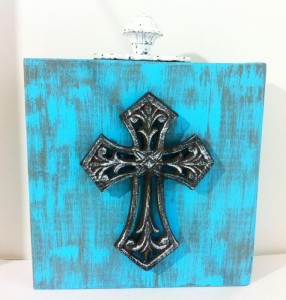 Home decor with metal cross and vintage drawer pull