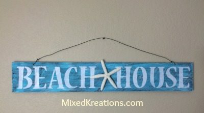 weathered beach house sign