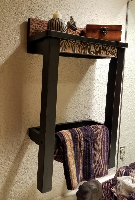 Repurposed wood chair turned shelf