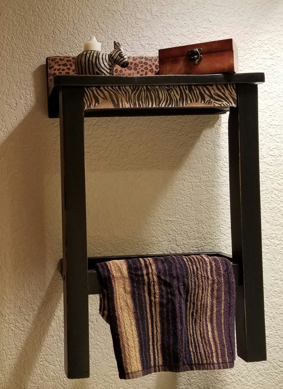 Repurposed wood chair turned shelf