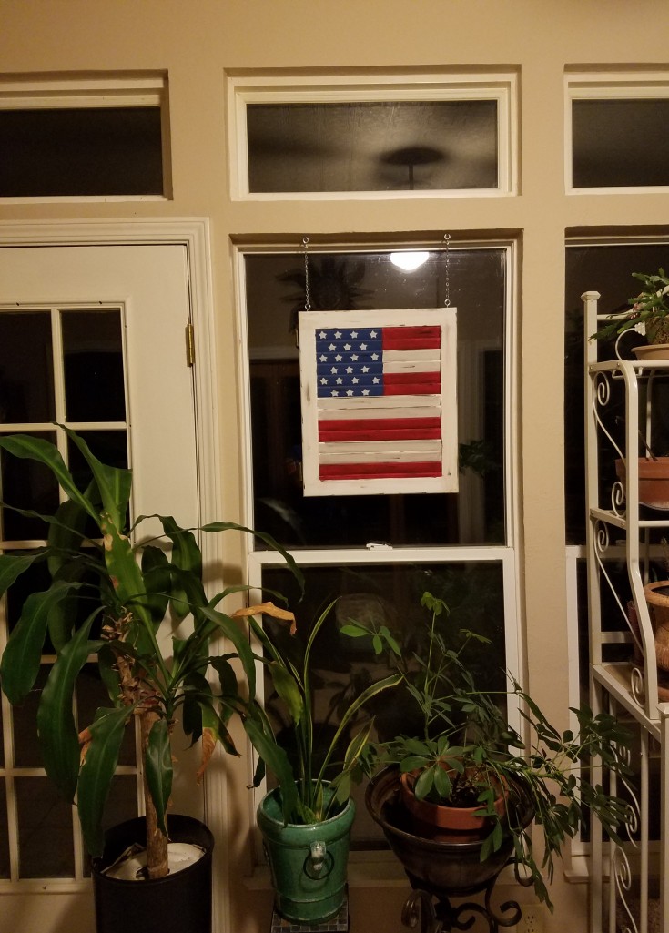 American flag made from a wood shutter