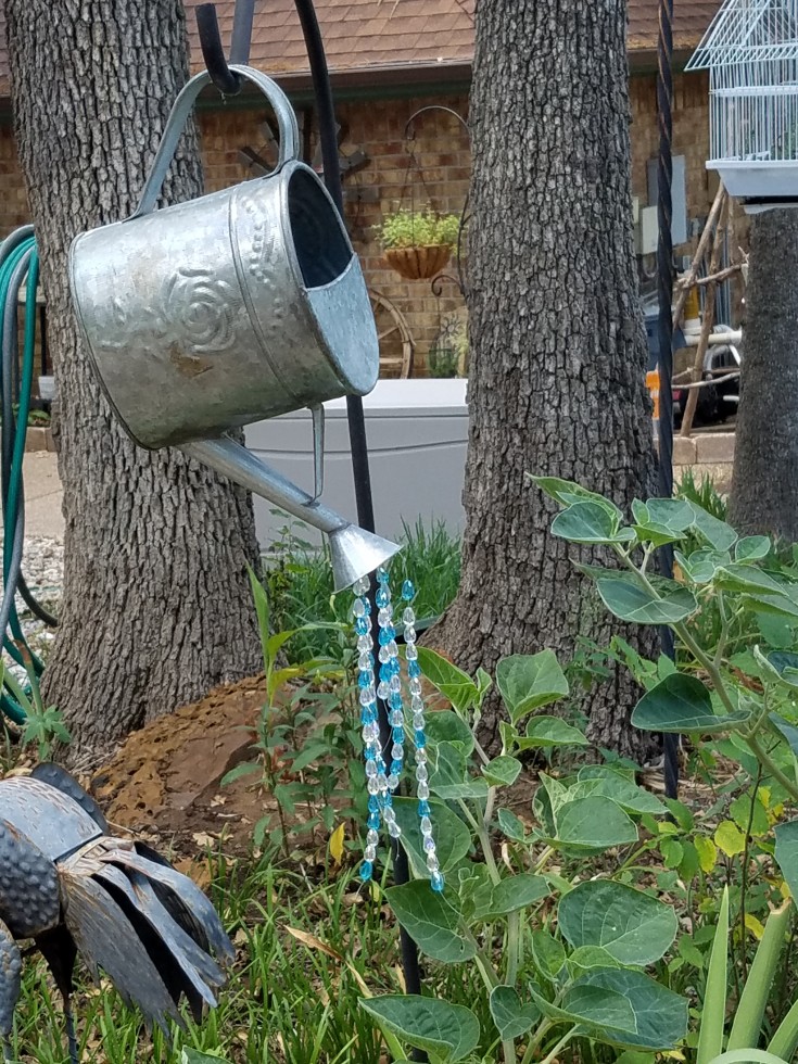 Diy yard art pitcher with bling | how to upcycle a garden pitcher into yard art #repurposed #upcycled #diy #yardart MixedKreations.com