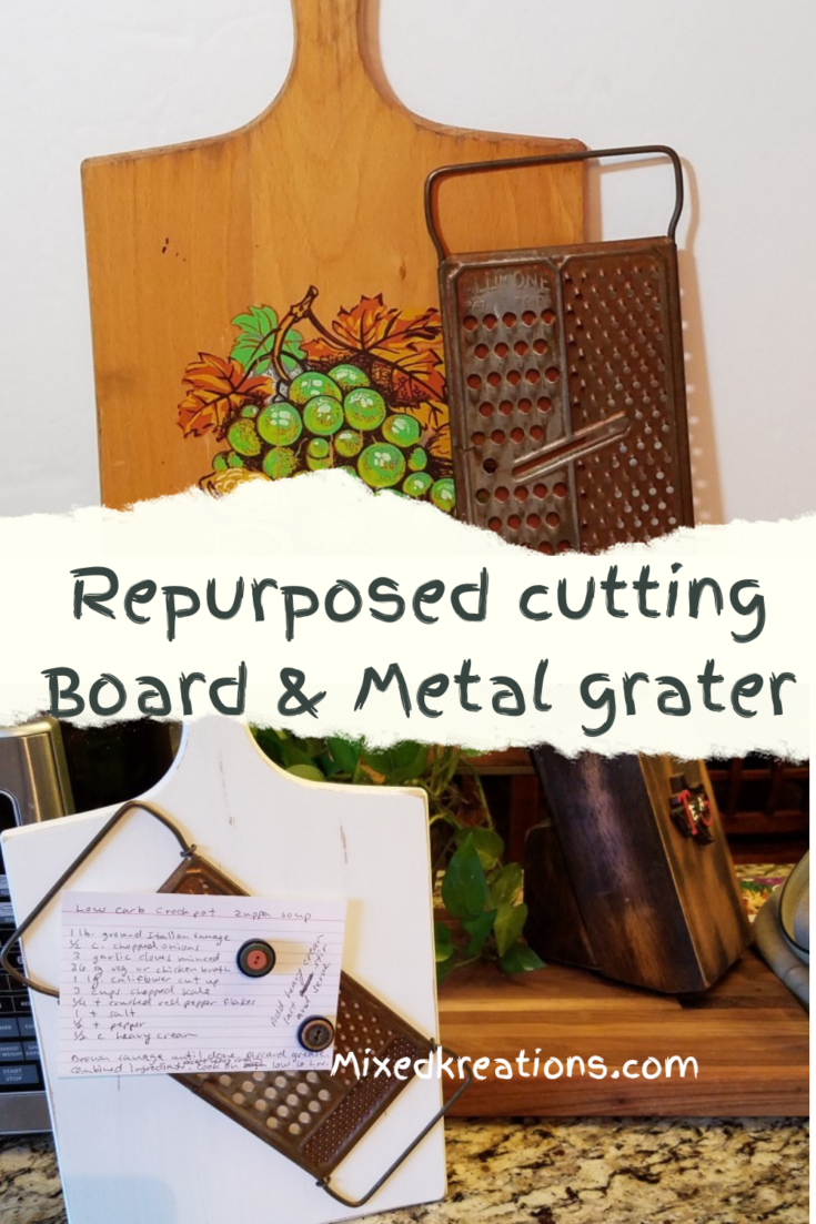 Repurposed cutting board and rusty grater. Doing photo display or recipe card holder