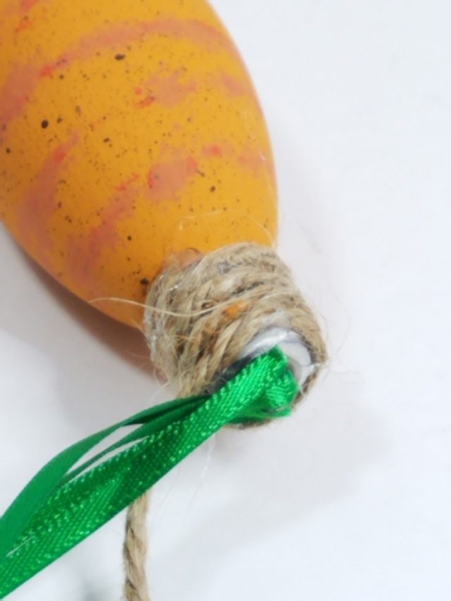 How to make Upcycled Light Bulb Carrots for Easter Decor out of used chandelier bulbs MixedKreations.com