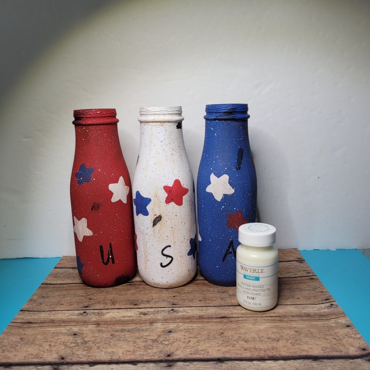 diy upcycle starbucks bottles into Patriotic decor